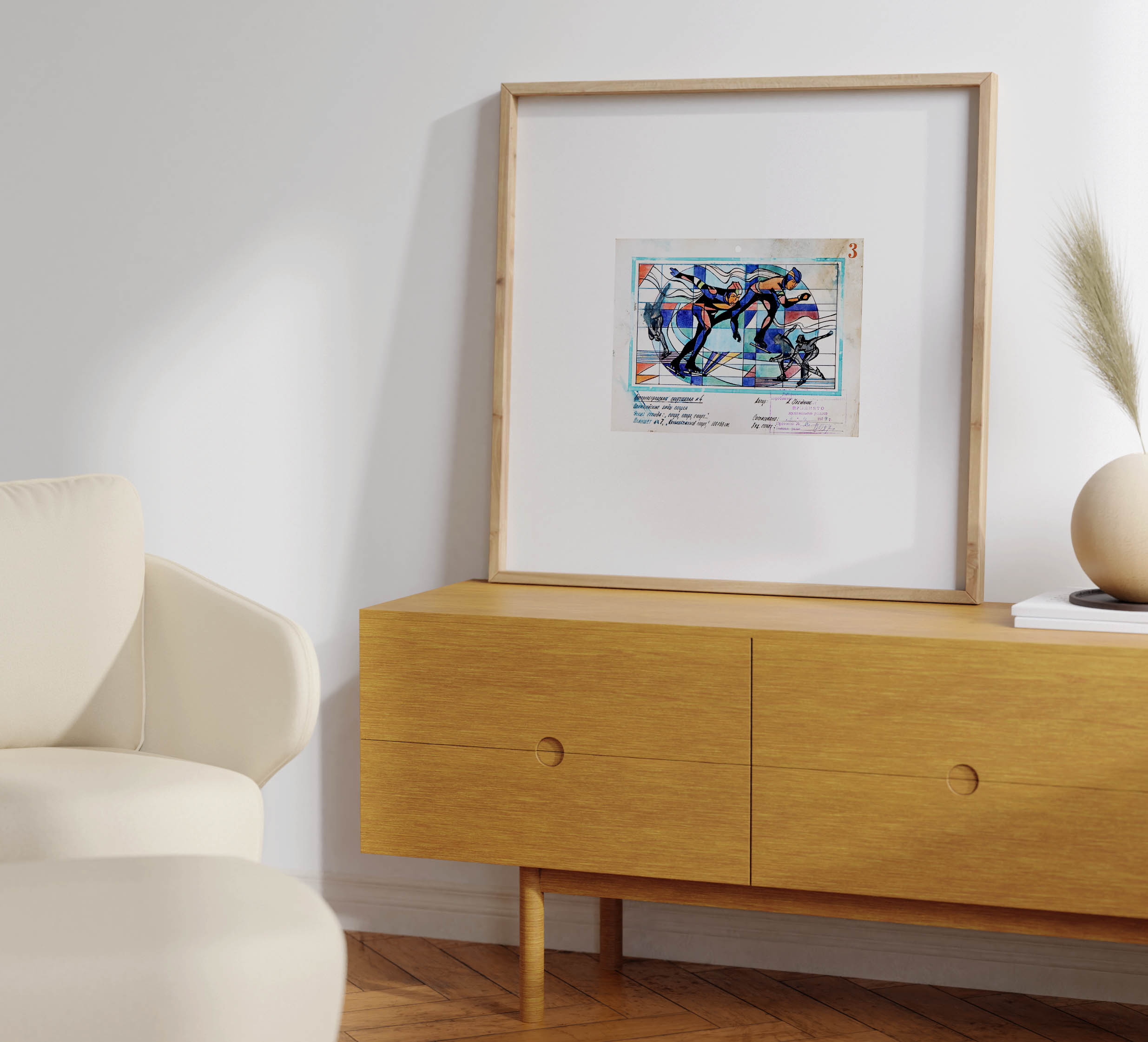 Modern minimalist living room featuring the framed speed skating artwork resting on a light wood cabinet next to a cream-coloured armchair.
