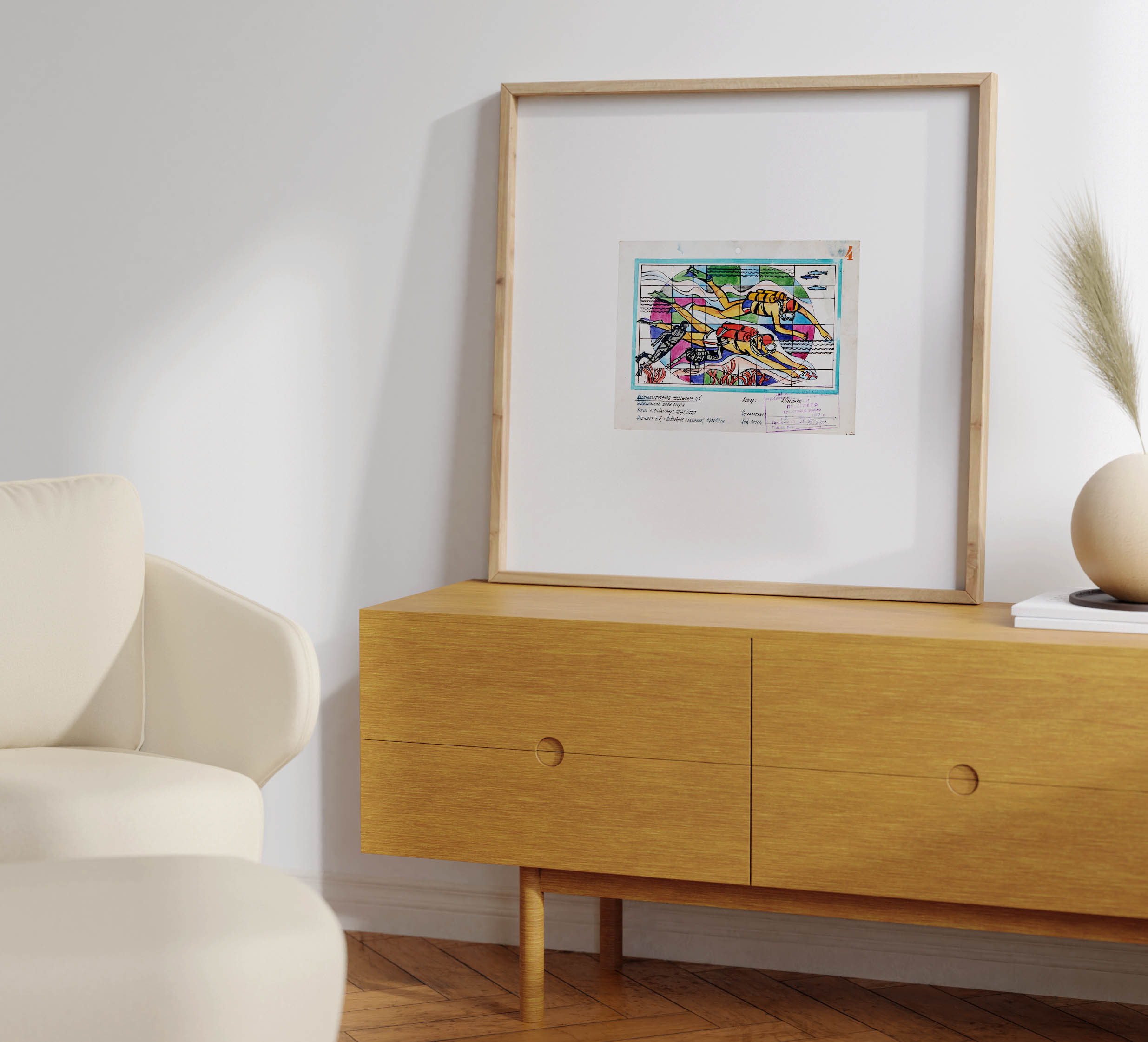 The framed scuba diving artwork by Alexey Petrovich Oleinik displayed on a light oak credenza in a bright room next to a cream armchair and a minimal ceramic vase.